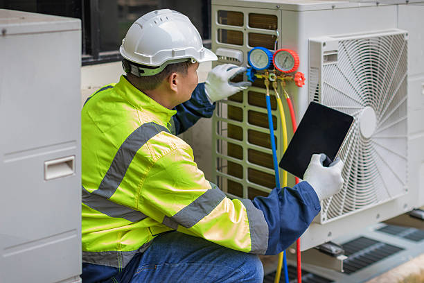 Professional Hvac Maintenance technician working in Montgomery Village, MD